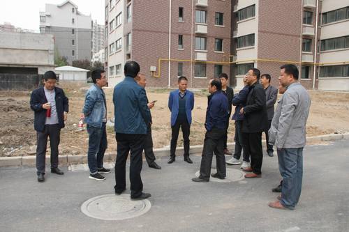 銅煤公司承建的銅煤2#小區(qū)水仙居5、6、7、8#樓順利通過竣工驗收