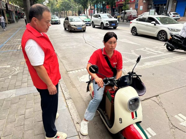 陜煤建設(shè)機(jī)電安裝公司：交通文明勸導(dǎo)，我們在“路”上